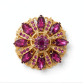 Circa 1950’s-1960’s gold-tone filagree brooch with vibrant magenta & pink navette rhinestones