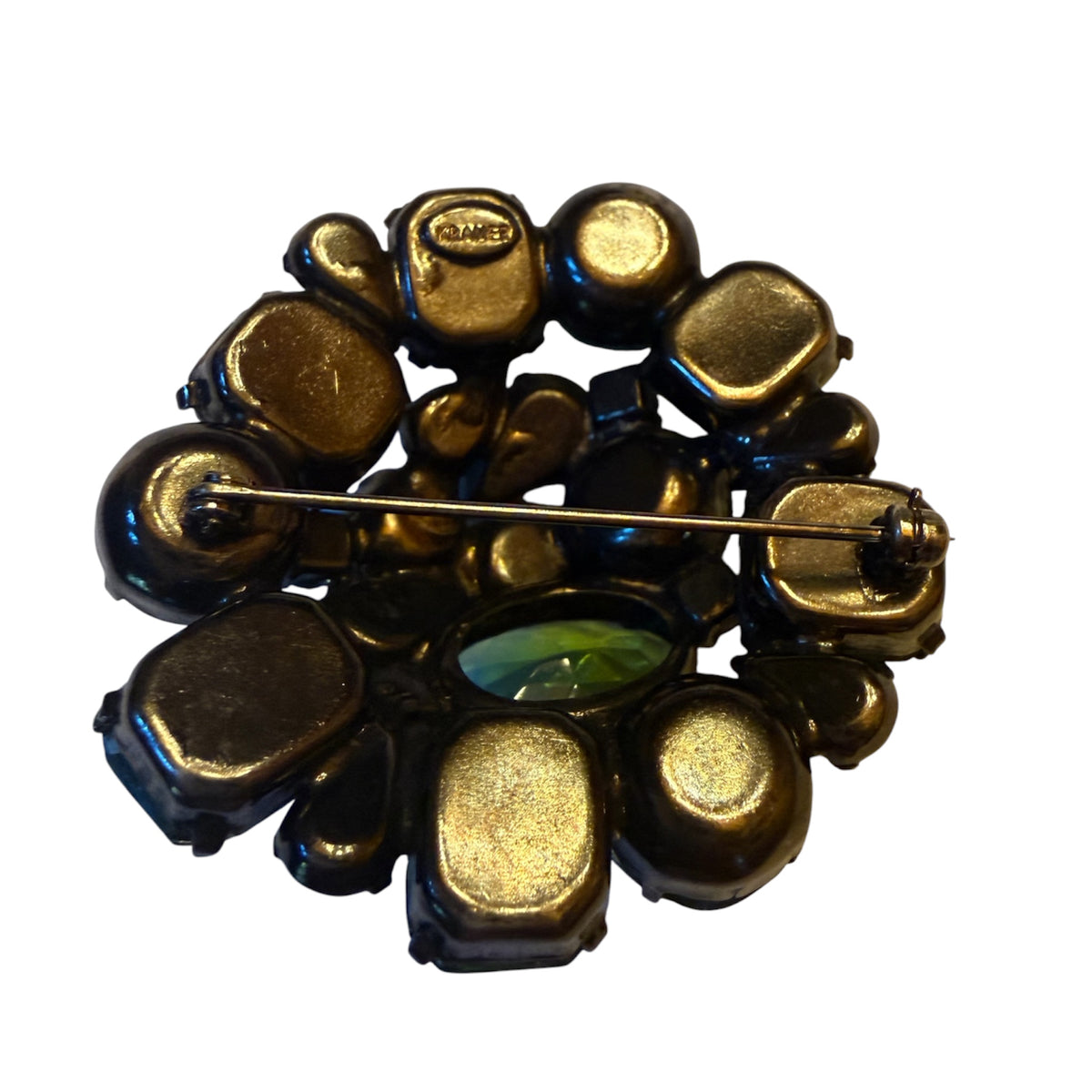 Signed Kramer 1950’s dimensional, domed, round cluster brooch with peacock colored faceted glass stones. Wow factor Sparkle!